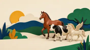 Dyrefigurer af en hest, ko og vinget fantasihest i et farverigt papirlandskab